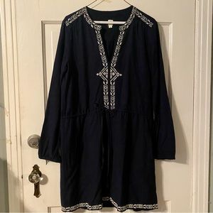 Women’s navy blue dress with white embroidered details
